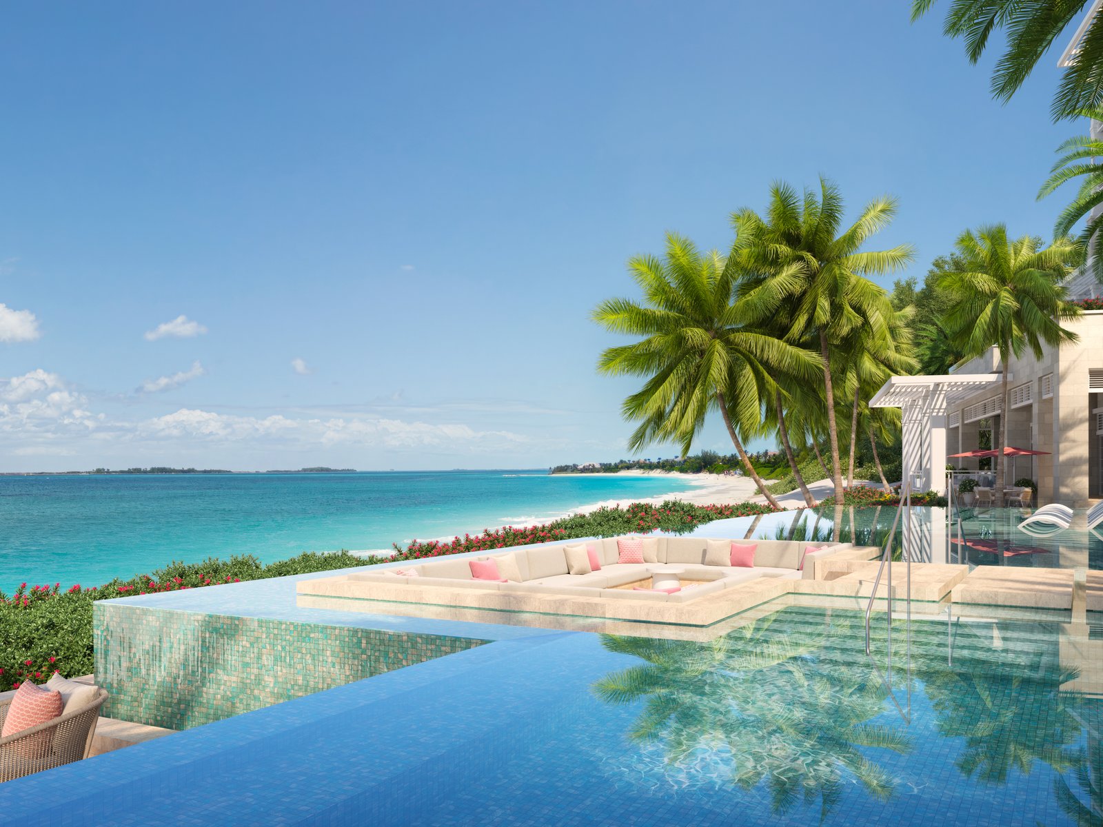 Oceanfront pool with sunken lounge and palm trees at The Ocean Club, Four Seasons Residences, Paradise Island, Bahamas